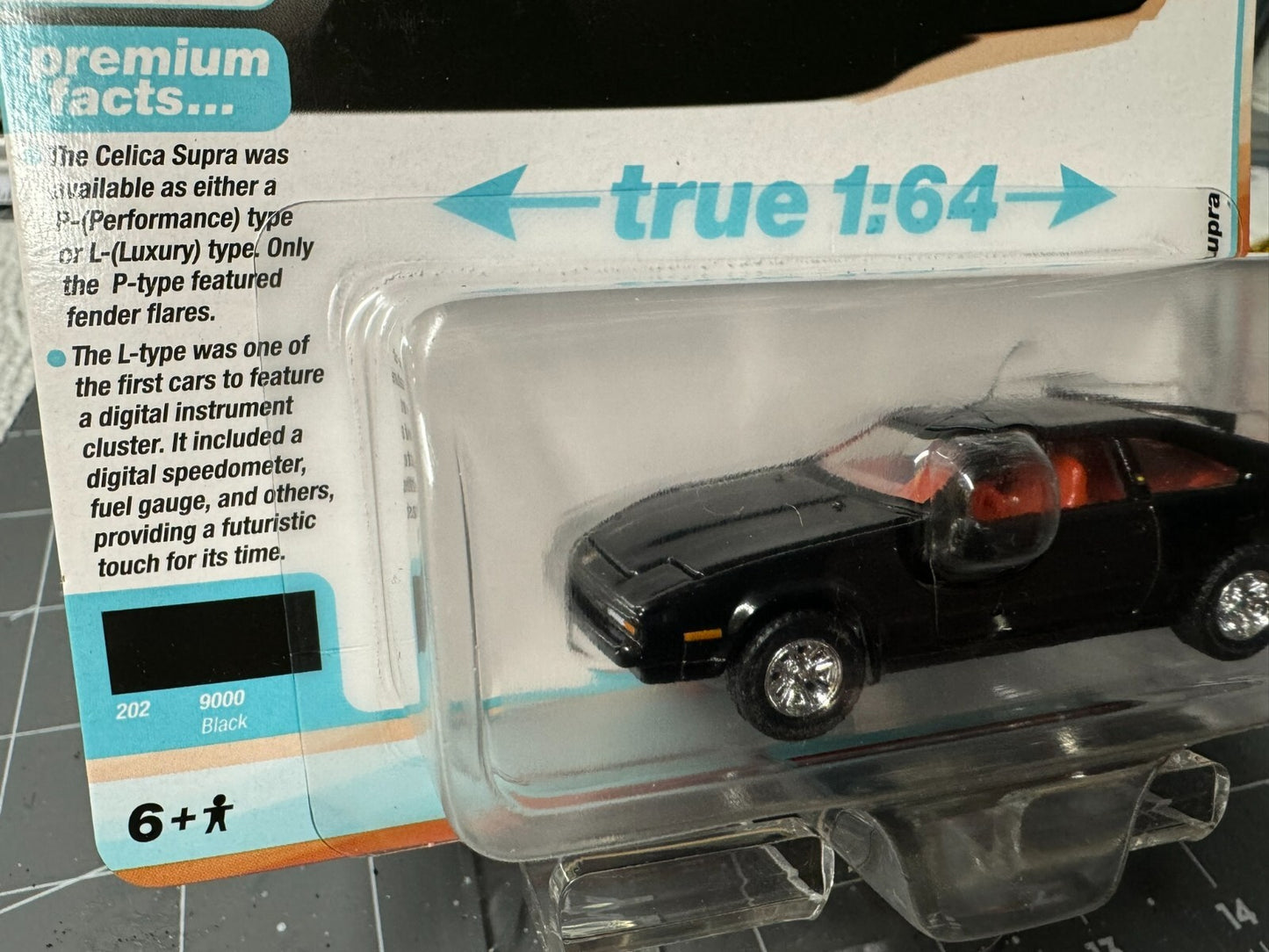 1:64 AutoWorld Premium 2024 R2A - 1983 Toyota Celica Supra in Black # AW64442A