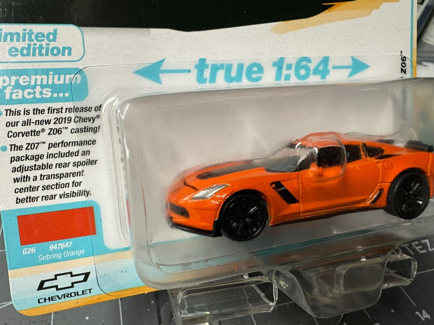 1:64 AutoWorld Premium 2024 R2A - 2019 Chevy Corvette Z06 Orange #AW64442A