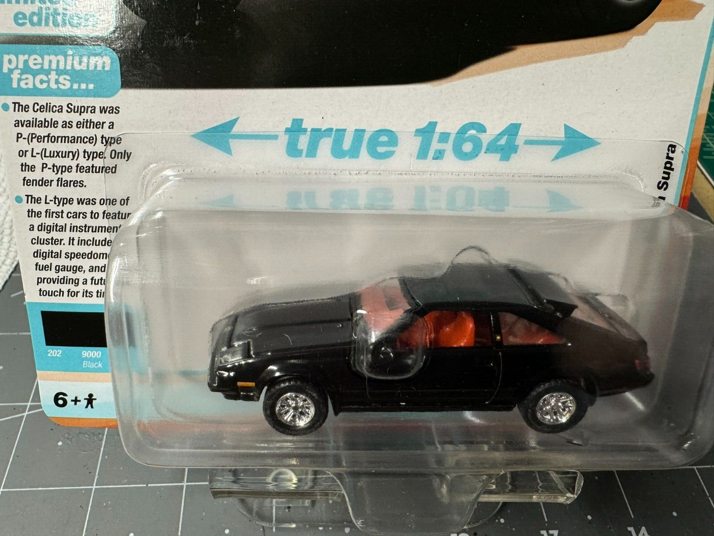 1:64 AutoWorld Premium 2024 R2A - 1983 Toyota Celica Supra in Black # AW64442A