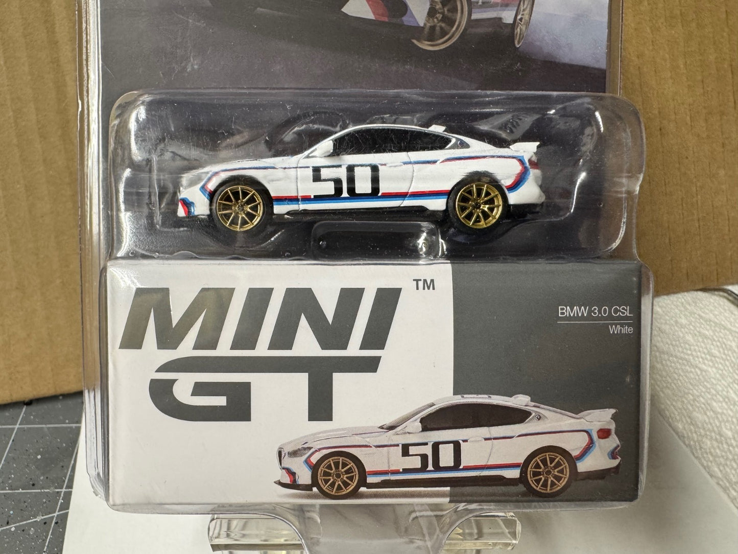 Mini GT BMW 3.0 CSL White  1/64 MGT00883-BL