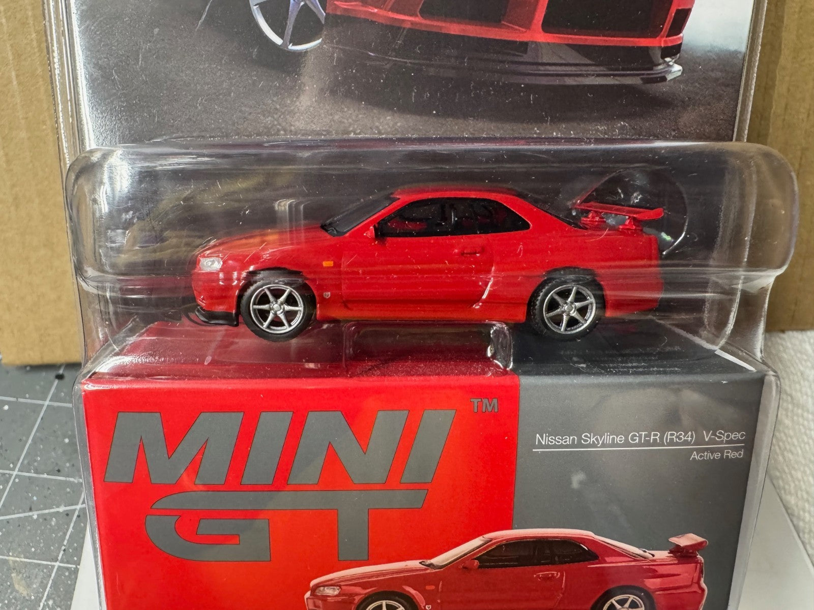 Mini GT Nissan Skyline GT-R (R34) V-SPEC Active Red  1/64 MGT00796-BL