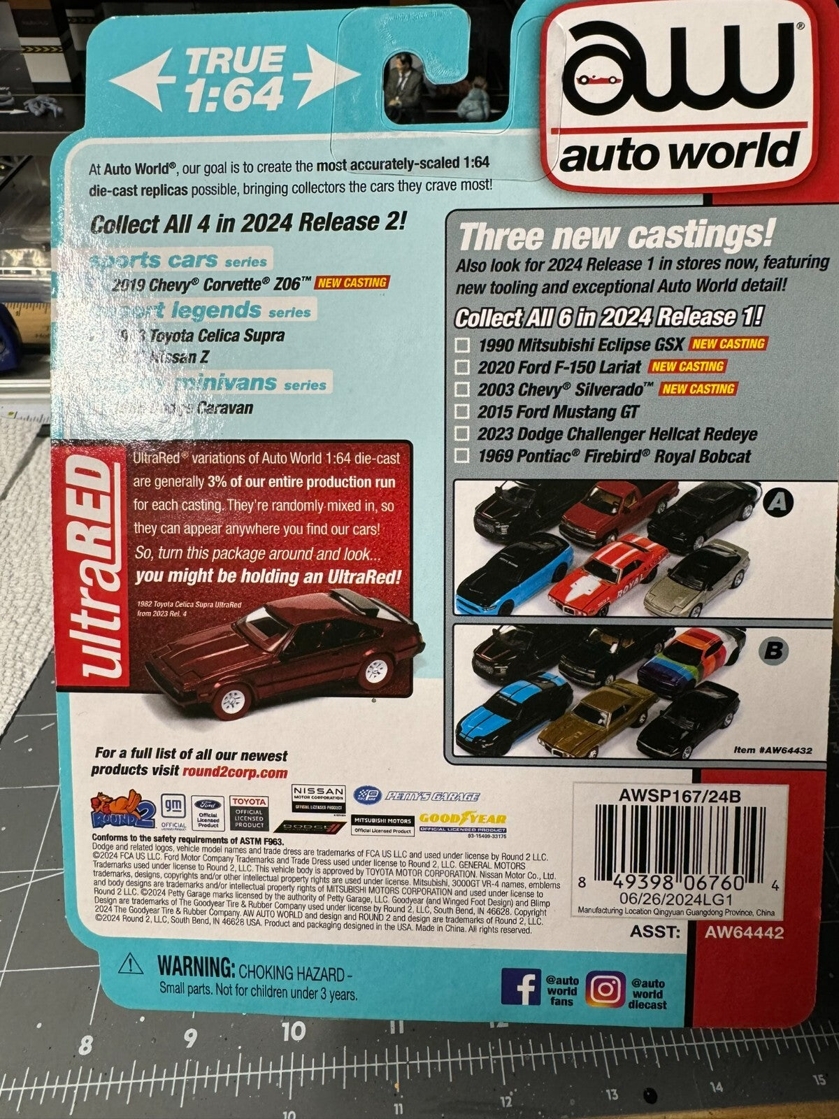 1:64 AutoWorld 1985 Dodge Caravan -Crimson Red w/Black Lower Sides #AWSP167B