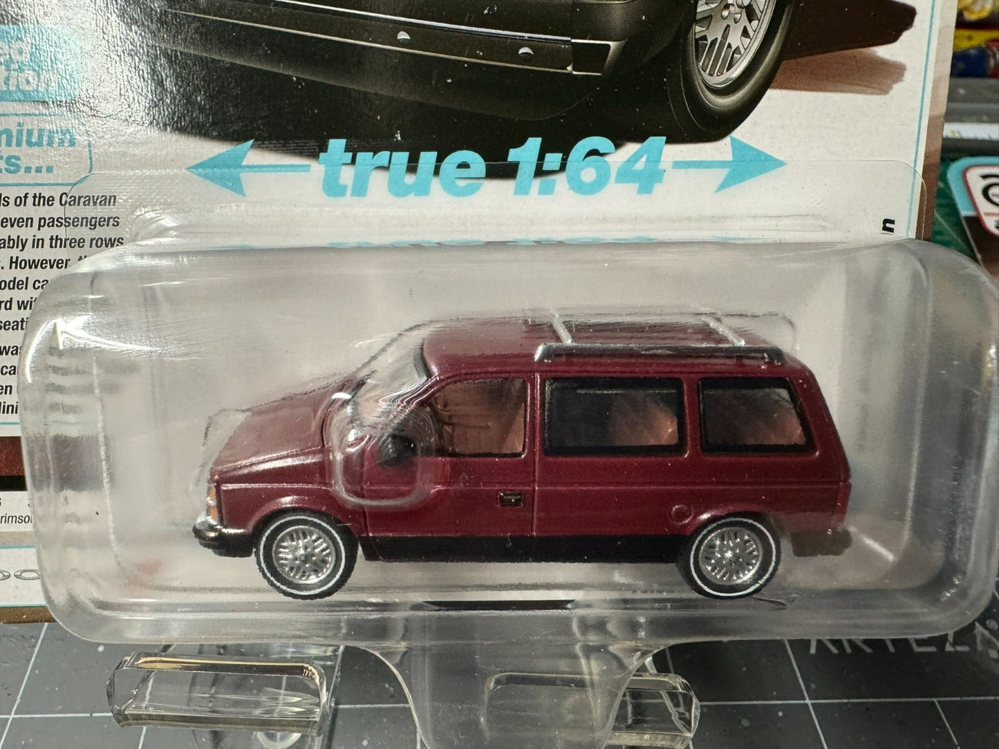 1:64 AutoWorld 1985 Dodge Caravan -Crimson Red w/Black Lower Sides #AWSP167B